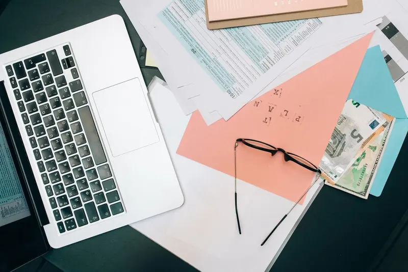 Financial planning and budgeting on a laptop at a desk
